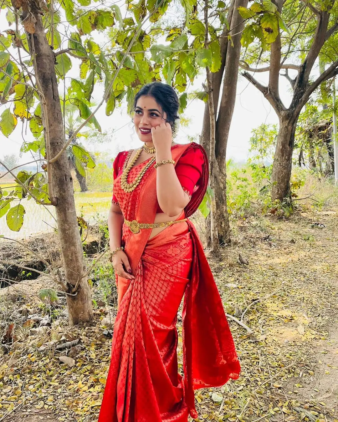 Shamna Kasim Wearing Beautiful Jewellery Orange Saree